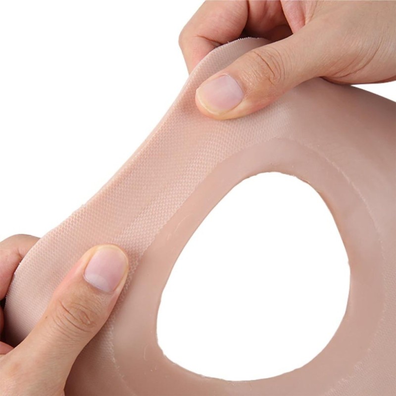 Buste faux seins silicone, dos nu